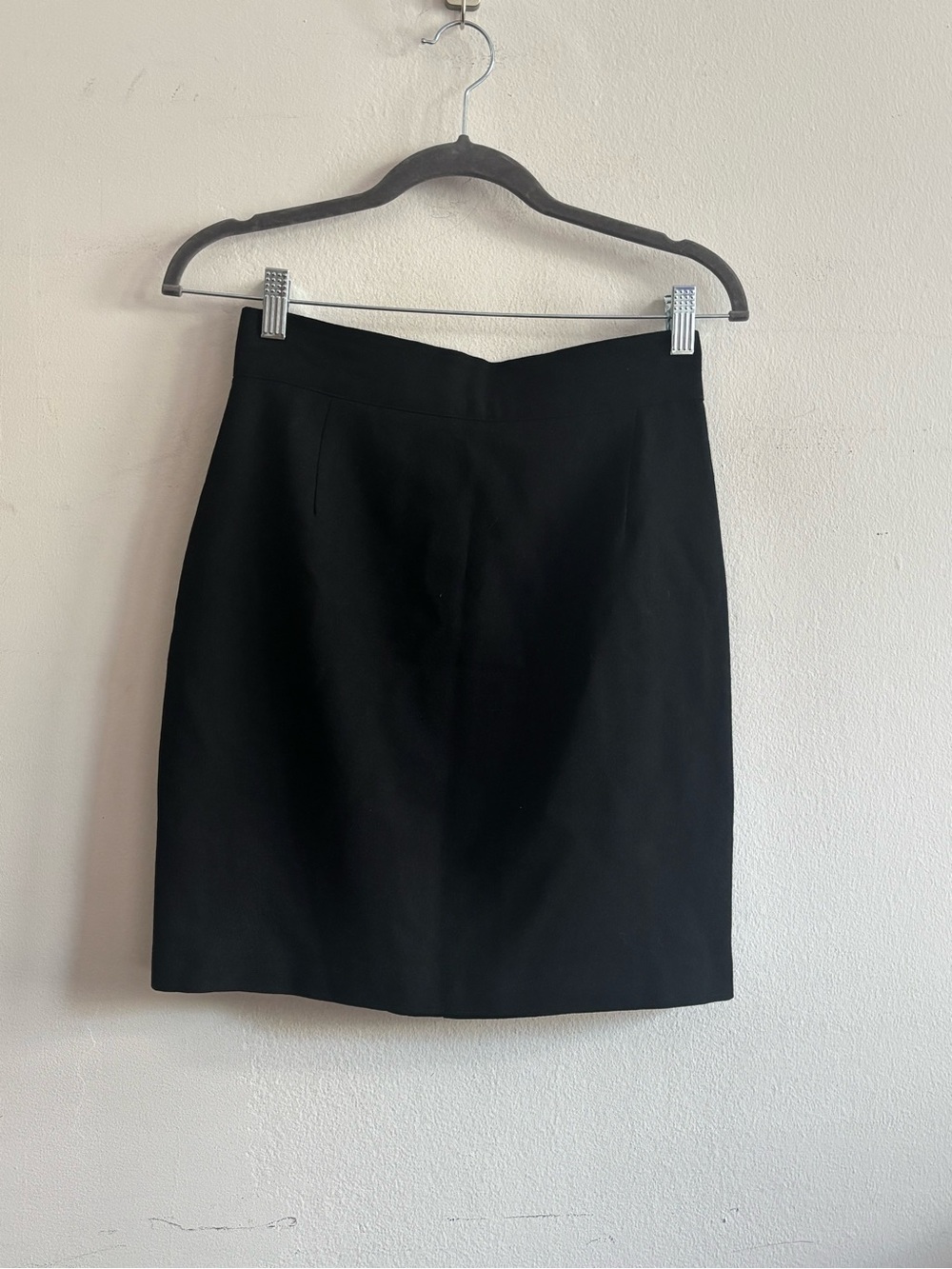 Juan silk black mini skirt with button detail in the back